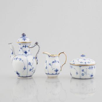 A "Blue fluted"/"Musselmalet riflet" porcelain mocha pot, a sugar box with cover and a creamer, Royal Copenhagen, 19th c.