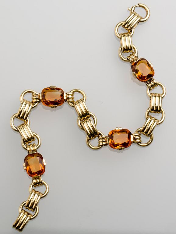 ARMBAND, 14 K guld med citriner, ca 9.00 ct. Vikt ca 16 g.