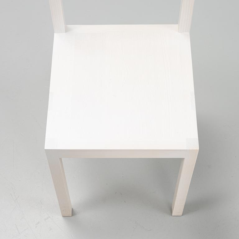 A pair of signed white stained pine chairs by Frederik Gustav for Frame, Copenhagen, 2023.