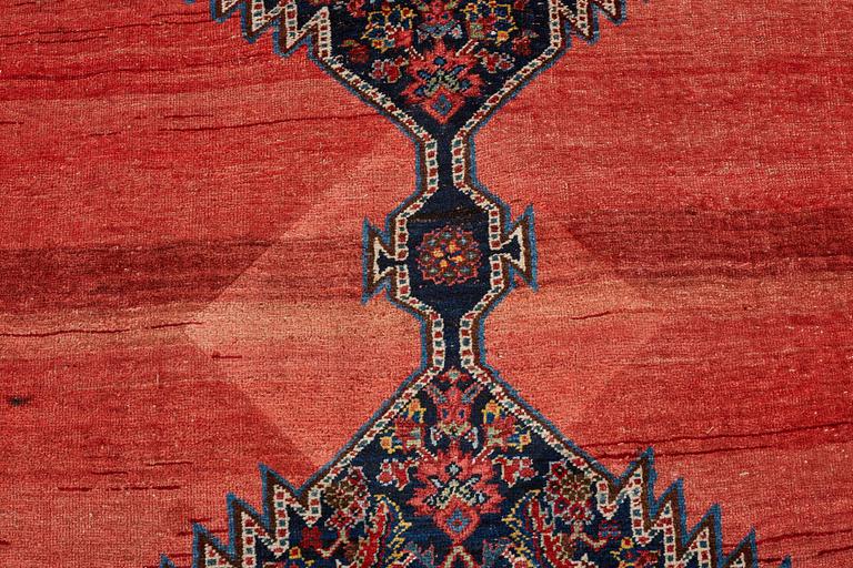 A CARPET, an antique Bidjar kelly, ca 587 x 230 cm.