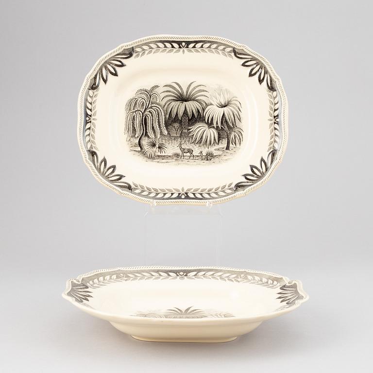 A 67 piece 'Exotica' creamware dinner service by Arthur Percy, Gefle.