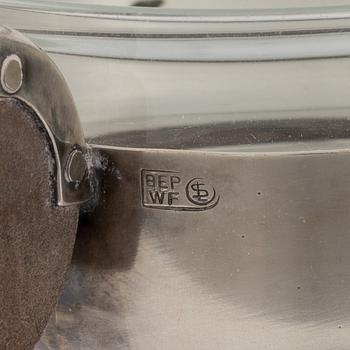 A 4-piece German silver coffee service and two German glass and silver plated tea cups, 1930's.