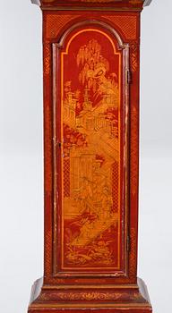 A grandfather clock, dial marked "John Thompson, England", 19th century.