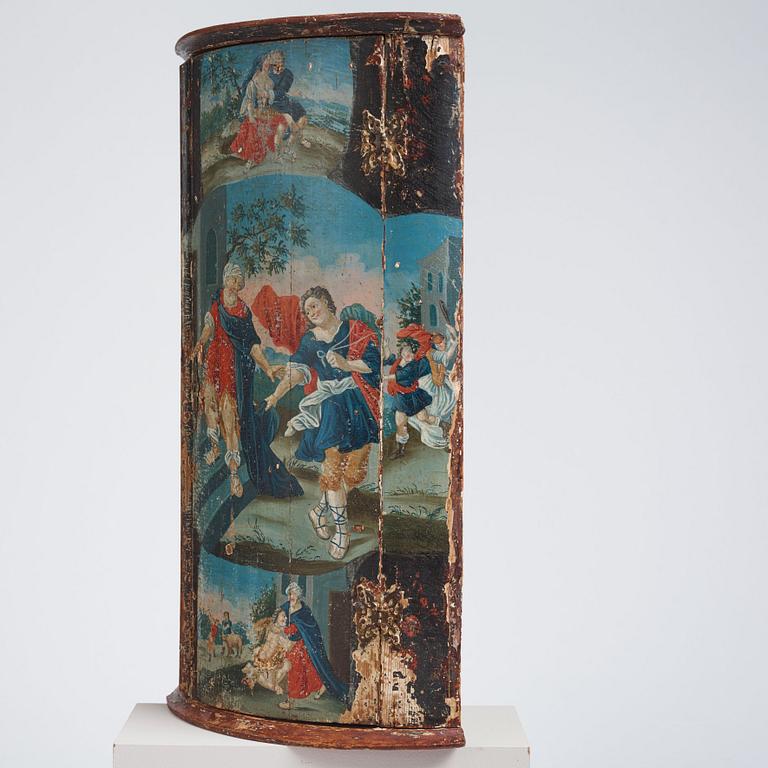 A Swedish late Baroque polychrome-painted corner cabinet, mid 18th century.