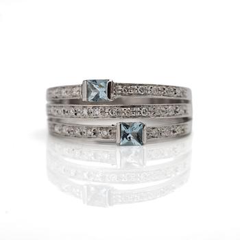 Ring, 18K white gold with aquamarines and brilliant-cut diamonds.
