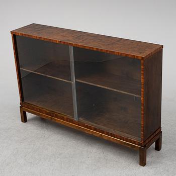 A stained birch veneered bookcase, 1930's.