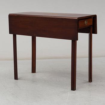 A late Gustavian mahogany dropleaf tablefrom around 1800.