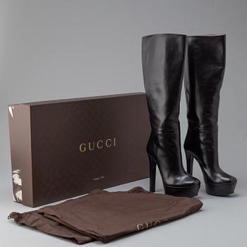 GUCCI, a pair of platform, high heel leather boots, size 37½.