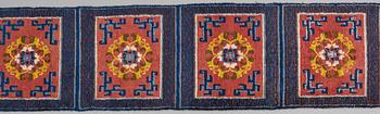 MATTO, a meditation carpet, ten squares, a semi-antique Ningxia, China, ca 598,5 x 62 cm.