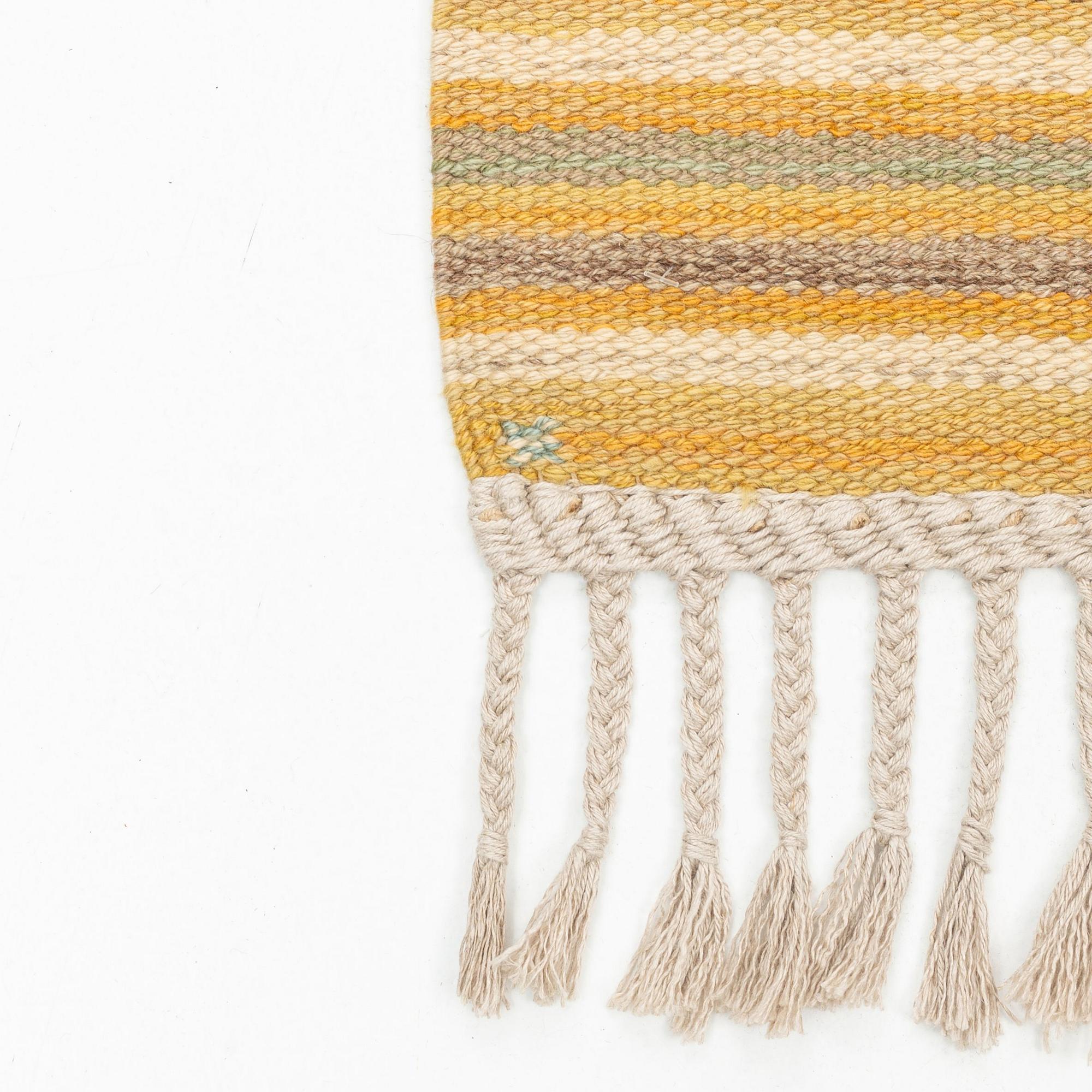 Barbro Nilsson, a carpet, "Spättan, gul", flat weave, ca 269 x 146 cm, signed AB MMF BN.