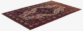 An antique Isfahan rug, Central Persia, c 234 x 146 cm.