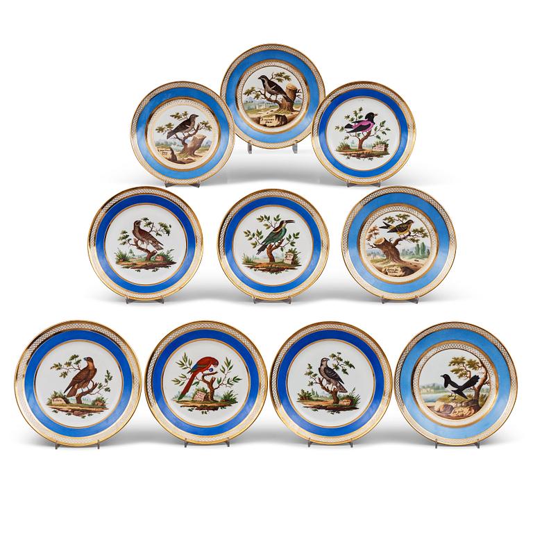 A set of 10 French ornitological dessert plates, signed Schoelber, 19th Century. (8+2).