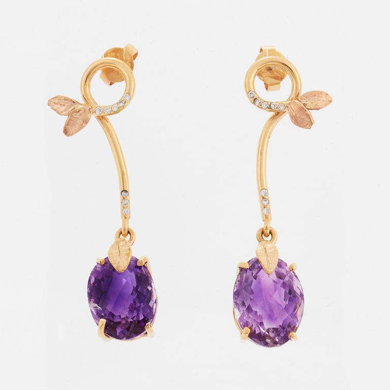 Oval briolette cut amethyst and brilliant-cut diamond earrings.