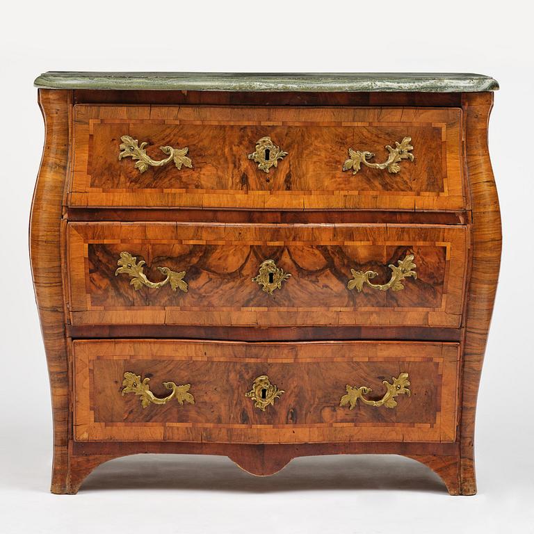 A Swedish rococo parquetry commode by C. Linning (master in Stockholm 1744-79).