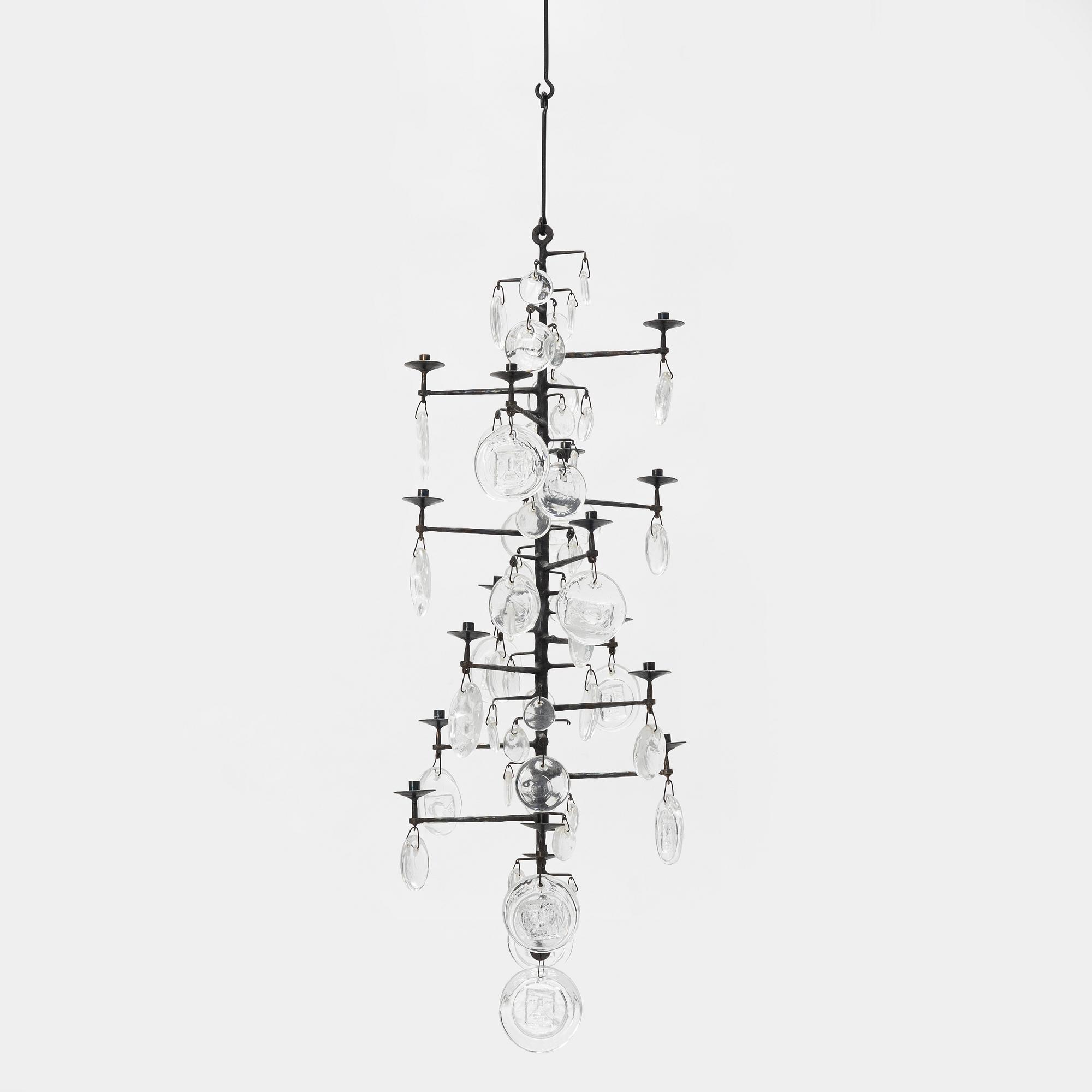 Erik Höglund, a 16 light chandelier for Boda Smide, Sweden.