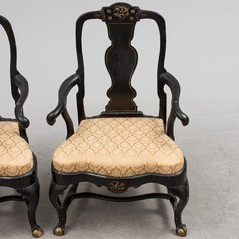 A pair of 18th century armchairs.