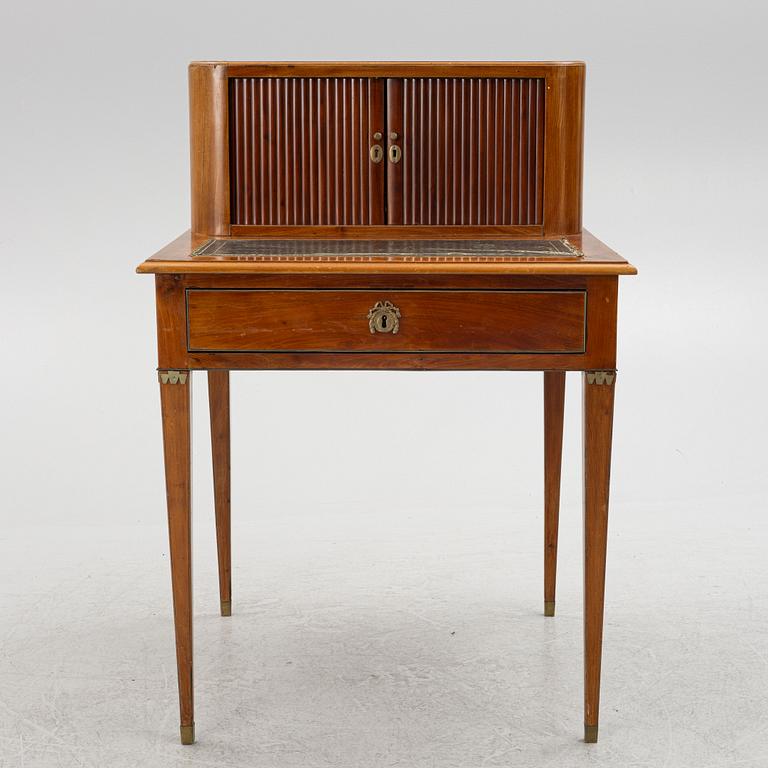 A mahogany-veneered desk, late Gustavian, Sweden, late 18th century.