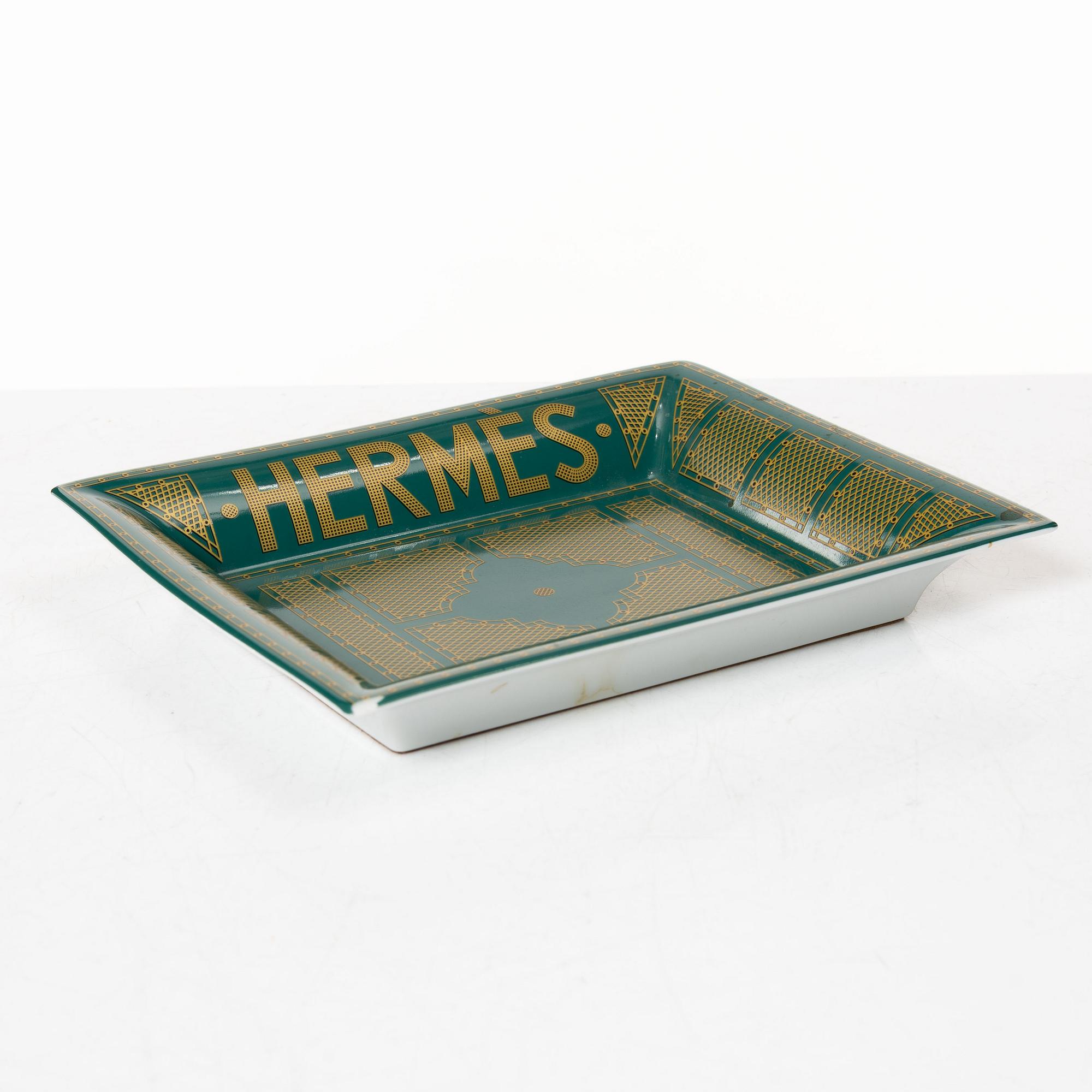 Hermès, a porcelain change tray, "Sellier".