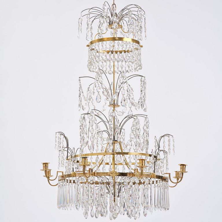 A late Gustavian gilt brass and cut glass eight-branch chandelier, Stockholm, late 18th century.