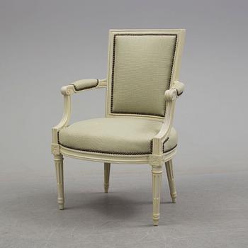 A 19th century Louis XVI style armchair.