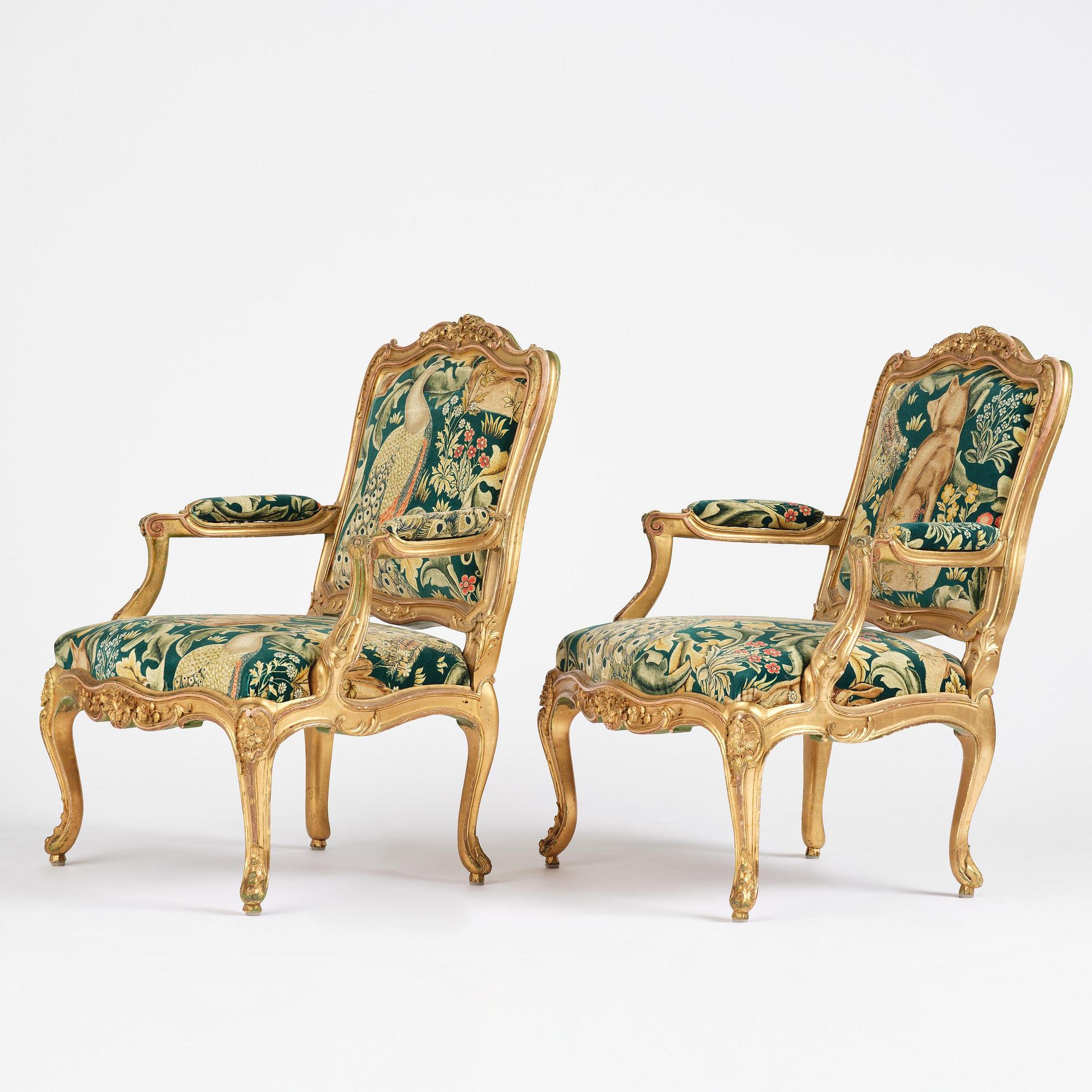 A pair of Louis XV-style giltwood fauteuils, late 19th century.