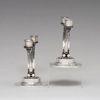 Harald Nielsen, a pair of sterling silver candelabra, Georg Jensen, Copenhagen 1933-44, model nr 278.