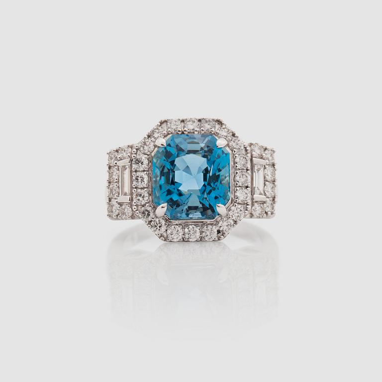 An aquamarine, 4.50 ct, brilliant- and baguette-cut diamond ring.