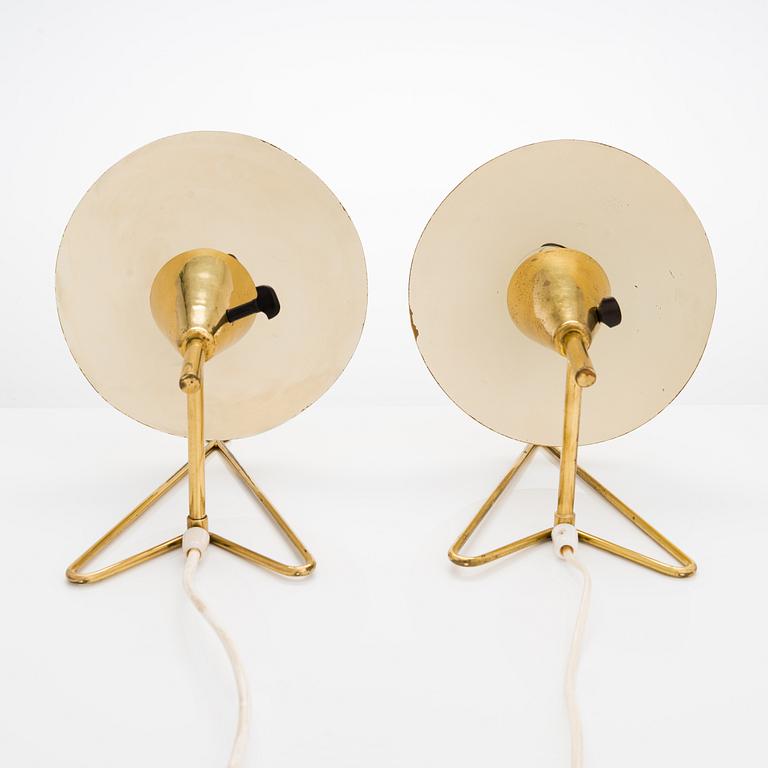 Two mid-20th-century wall lights / table lamps, model EV 57 for Itsu, Finland.