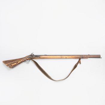 A Percussion rifle, 19th century.