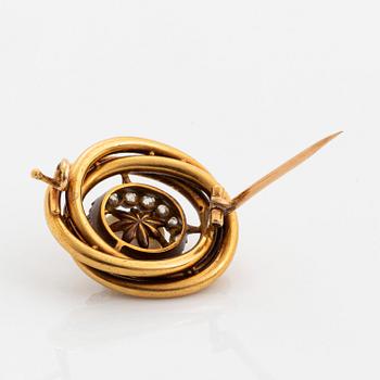 A 14K gold brooch set with a pearl and old-cut diamonds.