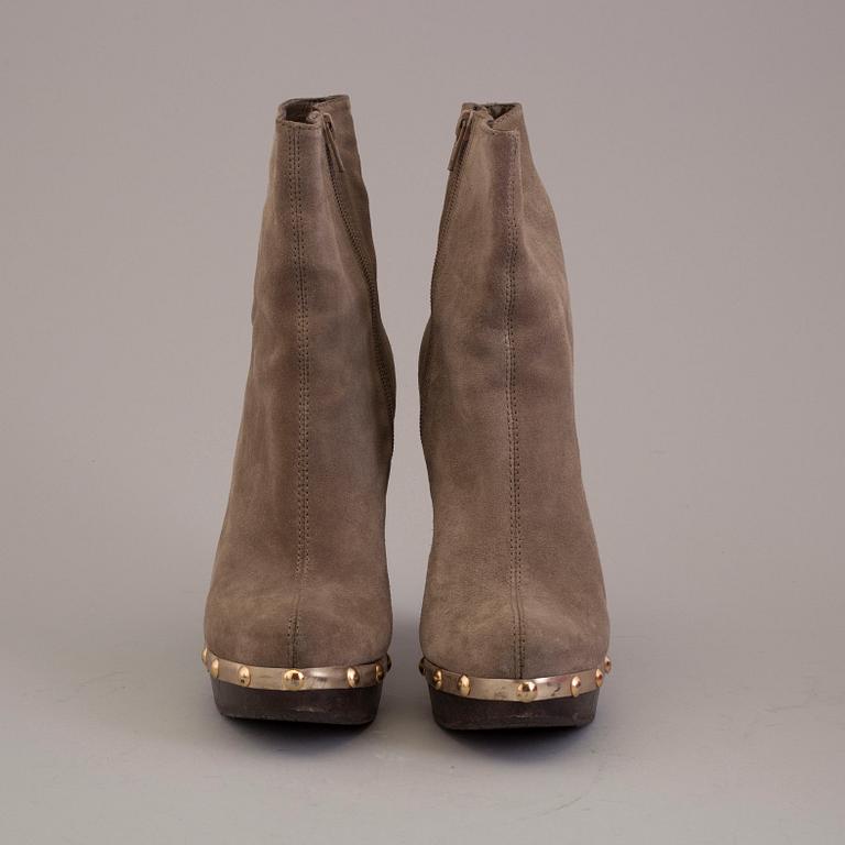 Boots by Diane von Furstenberg, size 7W.