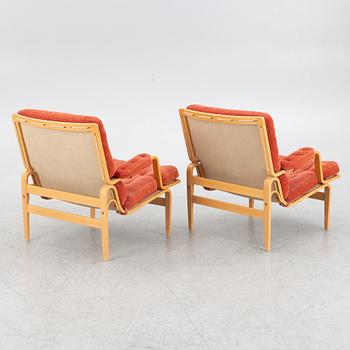 Bruno Mathsson, a pair of 'Ingrid' armchairs, Dux.