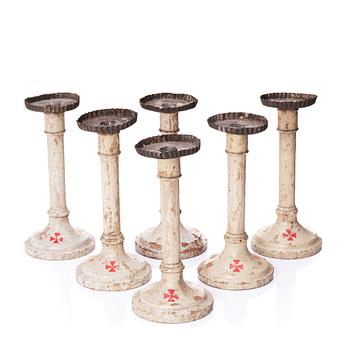 110. A set of six Empire wooden candlesticks, early 19th century.