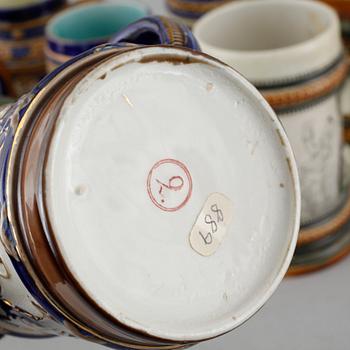 A set of eight majolica mugs from Rörstrand, around the turn of the century 1900.