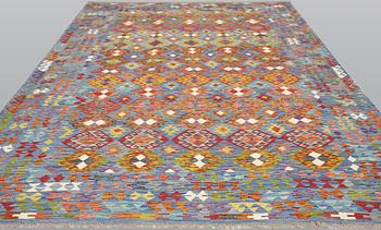 A Kilim carpet, approx. 350 x 250 cm.