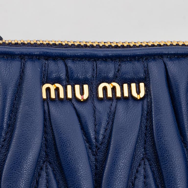 Miu Miu, clutch, "Contenitore Maniglia".