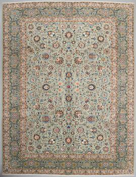 A SIGNED KESHAN RUG, 395 x 298 cm.