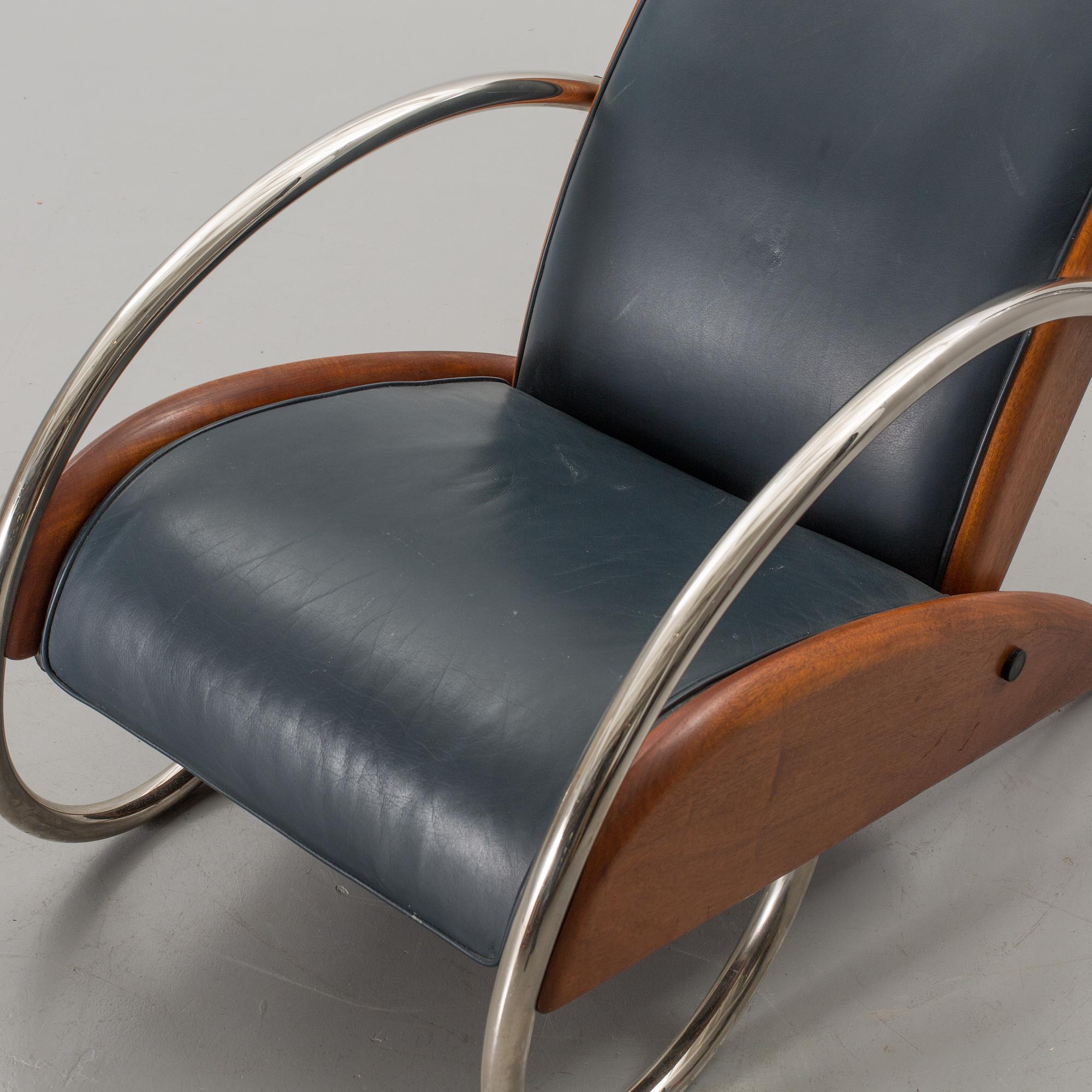 AN "STEAMLINE" ARMCHAIR BY KLAUS WETTERGREN, DENMARK, 1980'S.