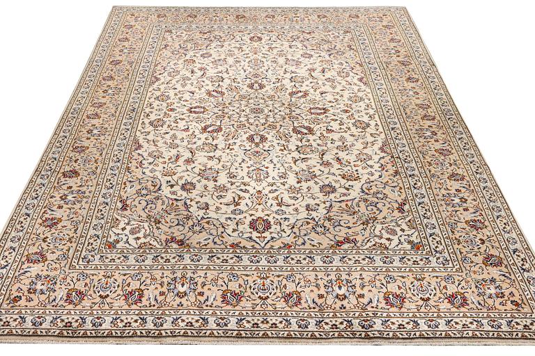 A Keshan carpet, c. 348 x 240 cm.