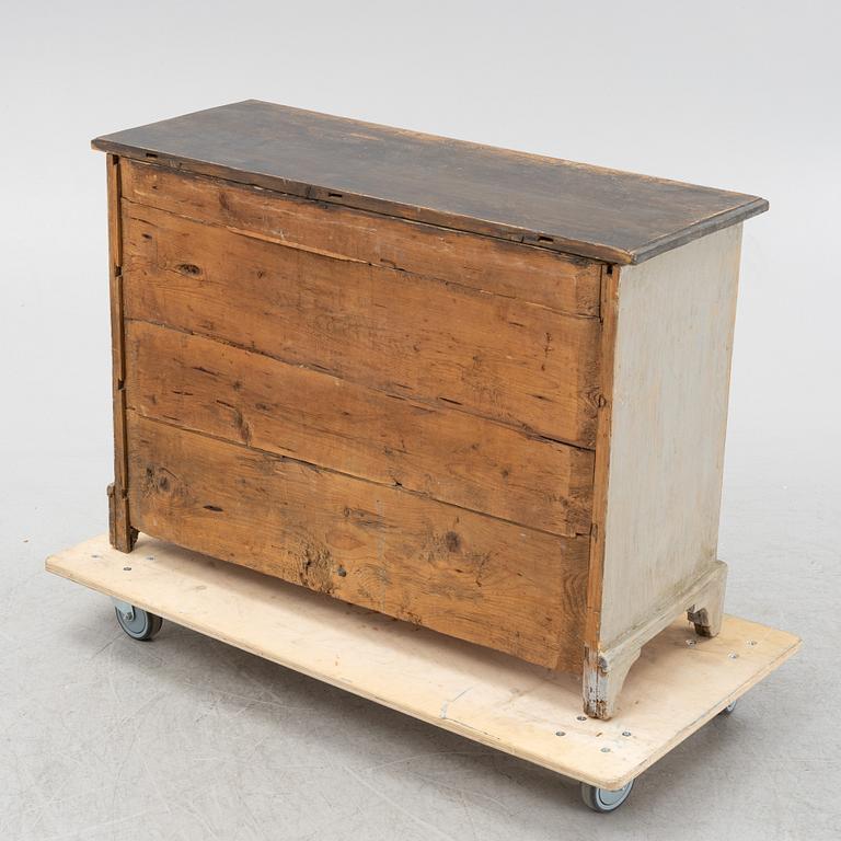 A 19th century chest of drawers.