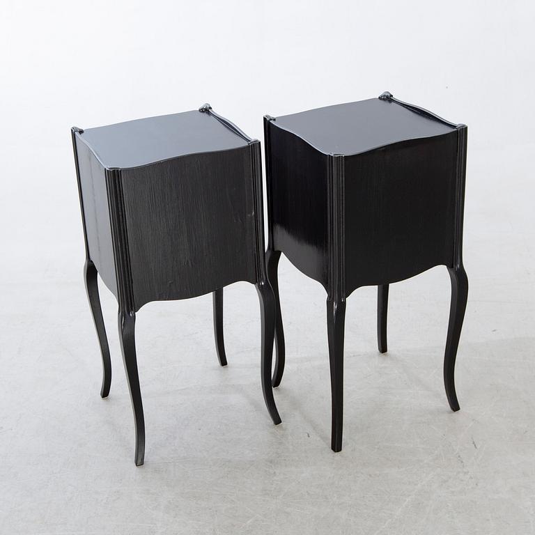 A pair of Rococo-style bedside tables later part of the 20th century.