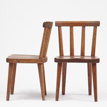 Axel Einar Hjorth, a set of four stained pine "Utö" chairs, Nordiska Kompaniet, Sweden, 1930s.