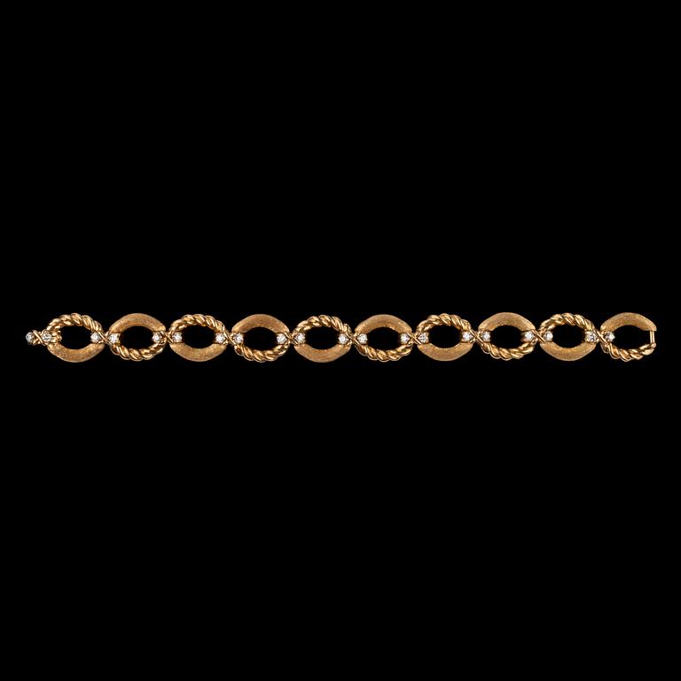 ARMBAND, Tiffany, guld med briljantslipade diamanter, tot. 1.20 ct.