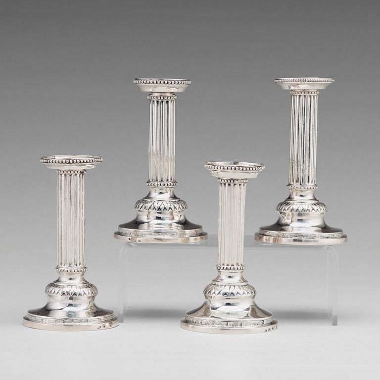 A matched set of four Gustavian silver candlesticks,