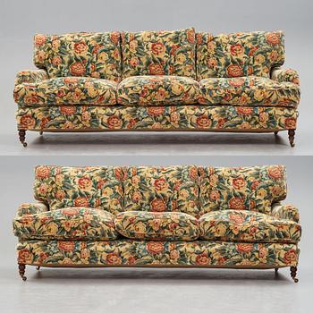 A pair of sofas, late 20th century.