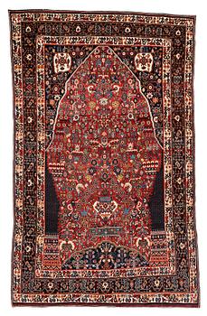 214. A CARPET, a semi-antique Qashqai, ca 265,5-268 x 169,5-171 cm (as well as one end with 2 cm flat weave).