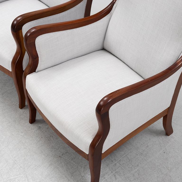 Frits Henningsen, attributed, a pair of wing back easy chairs, Denmark.