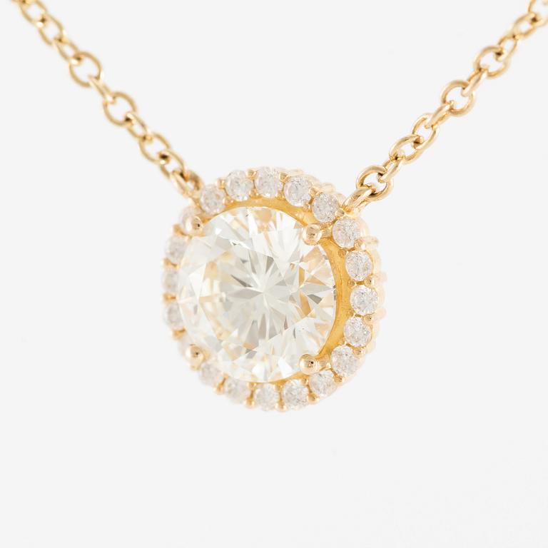 Collier 18K guld med briljantslipade diamanter.