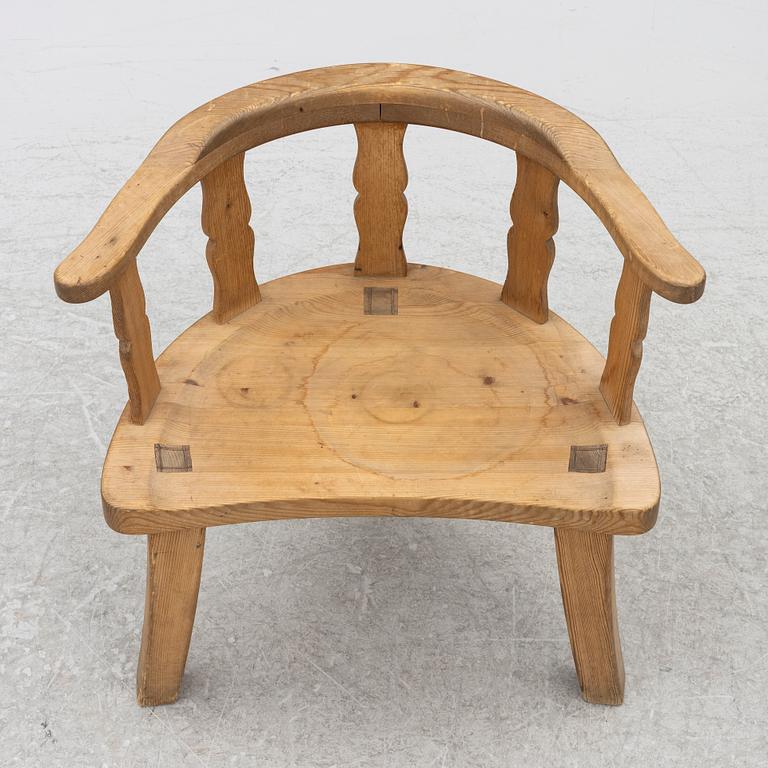 A folk art chair, circa 1900.