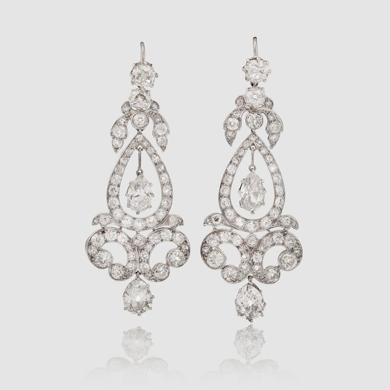 A pair of old-cut diamond earrings. Total carat weight circa 9.70 cts.